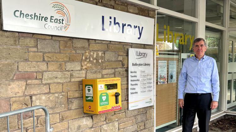 David Rutley MP outside Bollington Library