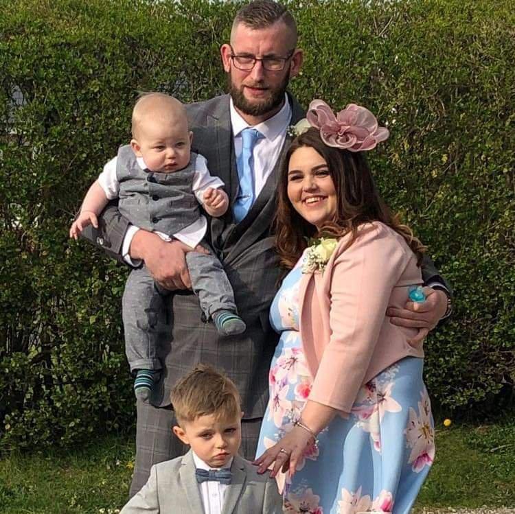 Leanne Jones with her partner, Andy and young sons, Harrington (bottom left) and Hudson (top left),