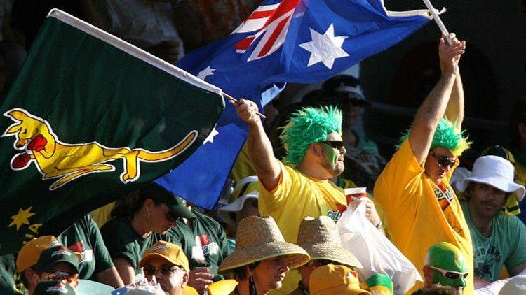Australia fans wave flags at the Gabba in 2006