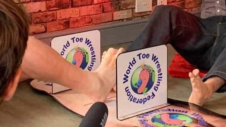 Toe wrestlers to put best foot forward in competition's 50th year - BBC ...