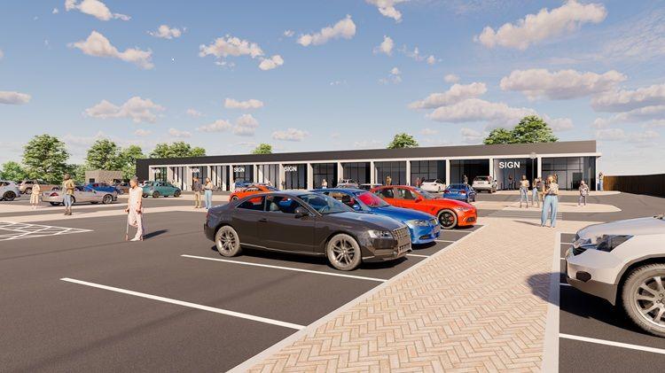 An artist's impression of a commercial site. There is a long black building with a glass front in the background, made up of several unnamed shop units. In front is a large car park with spaces and cars parked. People are walking around