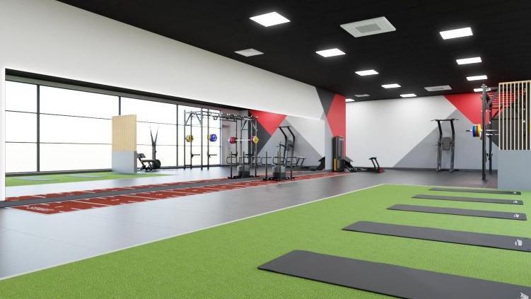 An artist impression of the new gym at Moorways Sports Village, showing a new sled track, a recovery area and new gym equipment.