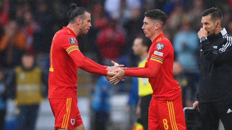 Harry Wilson replaces Gareth Bale during a Wales game in 2022