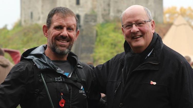 Professor Hamish Laing with Andrew at the finish line, in front of Cardiff Castle