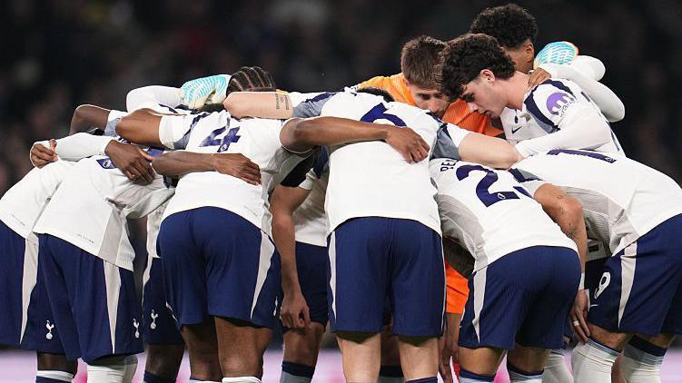 Tottenham players in a huddle