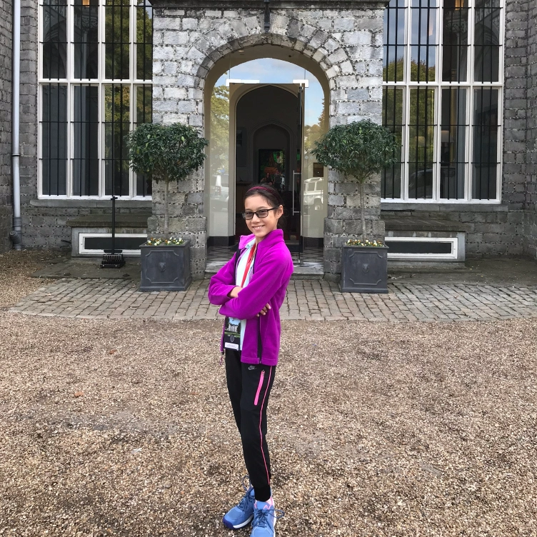 Caitlyn Scott-Lee  stood in front of her school in Wycombe