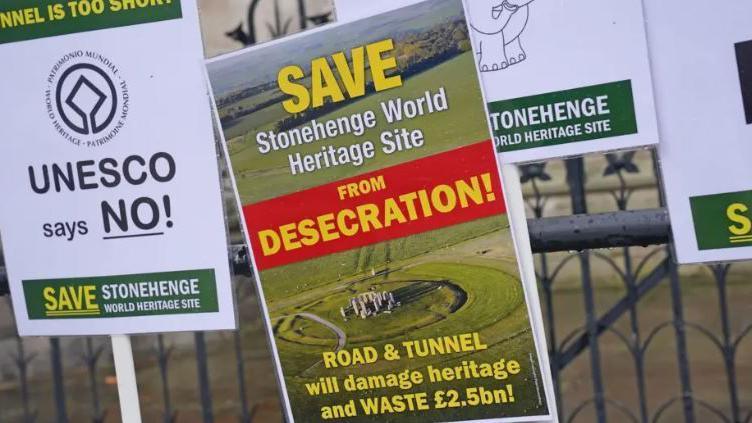 Posters asking people to save Stonehenge World Heritage site 