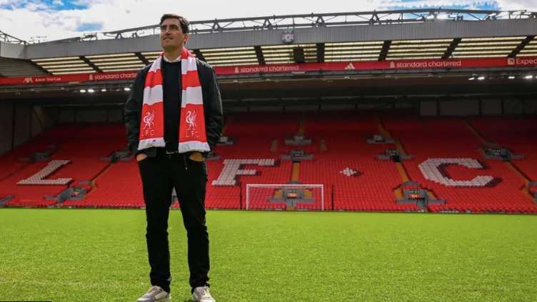 Andoni Iraola stands on the Anfield turf