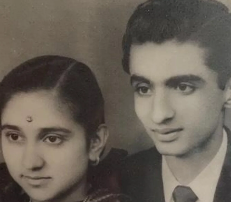 A black and white picture of a young Asian couple