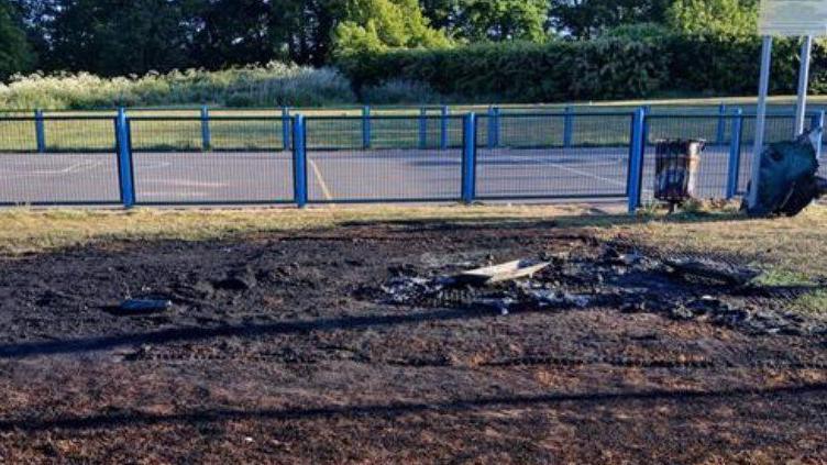 The aftermath of a fire on a playground