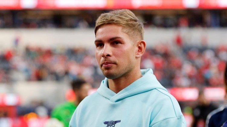 Emile Smith Rowe looks on