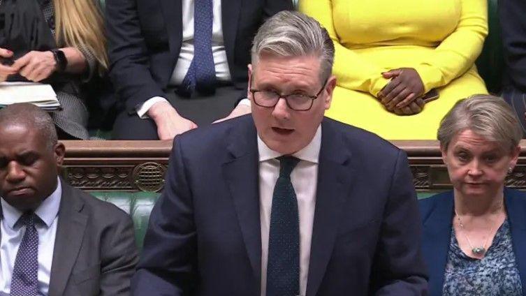 The Prime Minister speaking to other Members of Parliament 