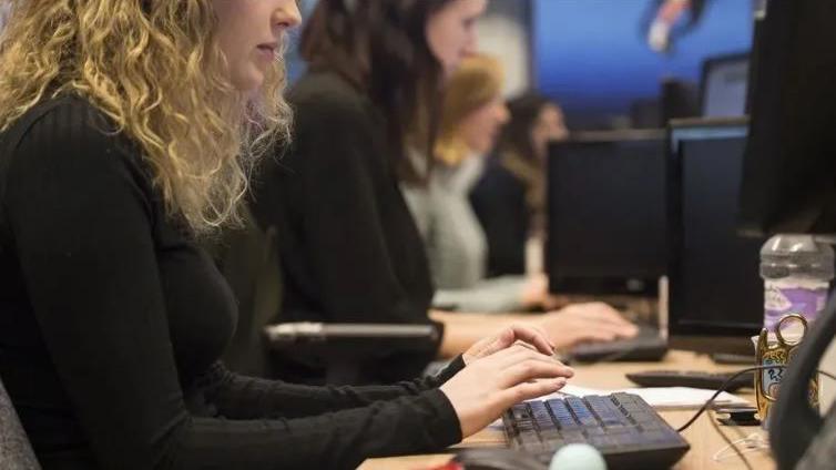 A woman working at a desk