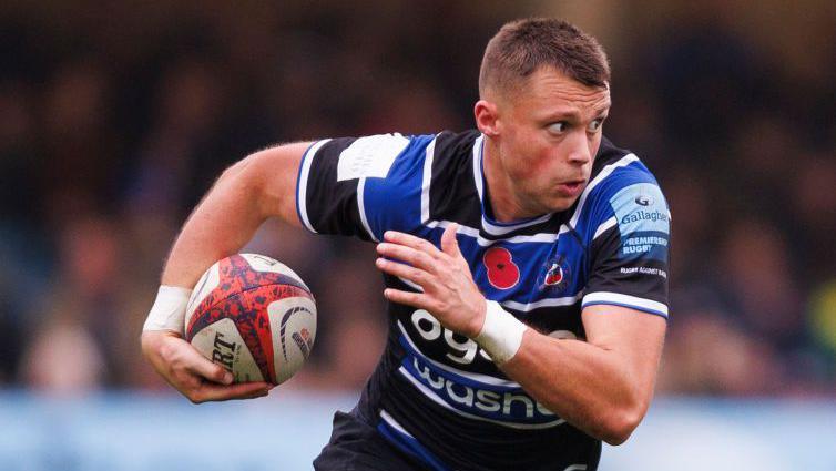 Tom Carr-Smith running with the ball during Bath's Premiership match against Sale