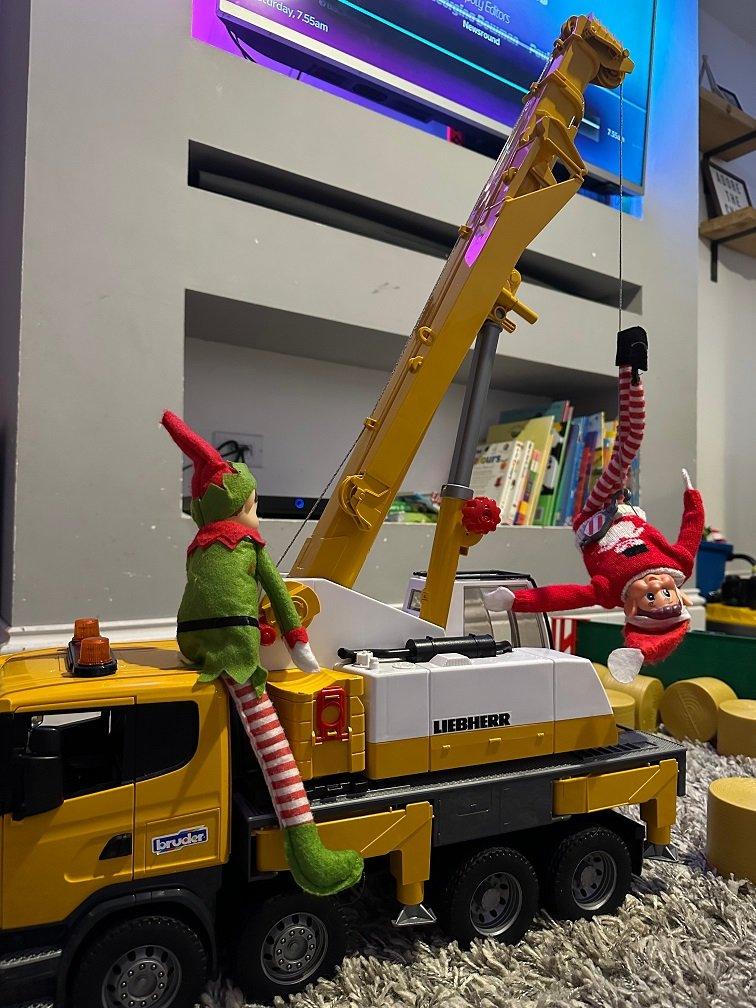 elf with toy crane