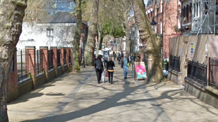 A google street image of New Walk in Leicester with people walking in both directions