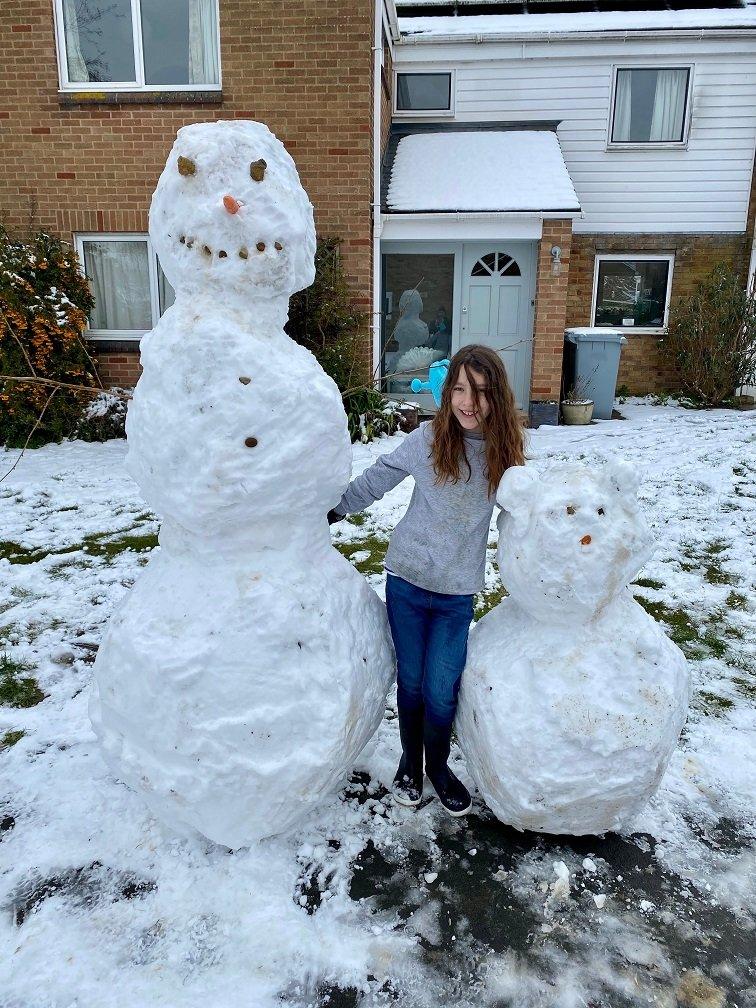 snowman and snow dog