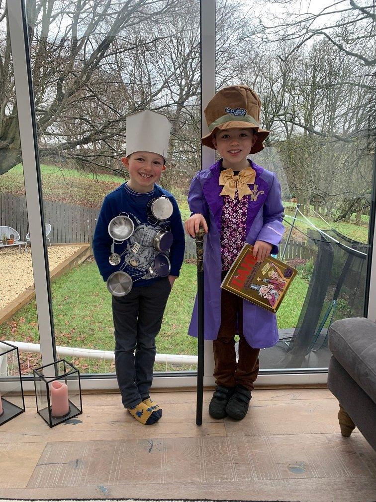 two boys dressed as Willy Wonka and the Saucepan Man from The Magic Faraway Tree.