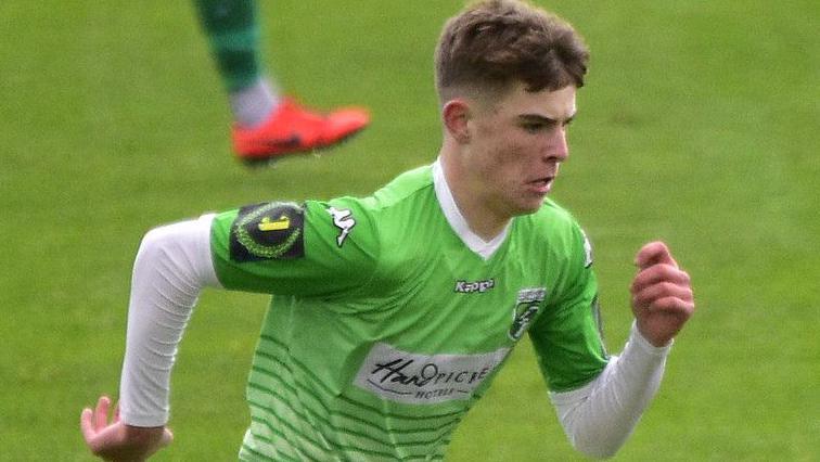 Alex Scott playing for Guernsey FC