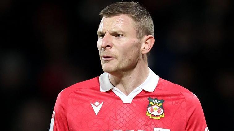 Paul Mullin cuts a frustrated figure as Wrexham take on Huddersfield