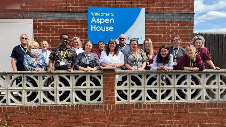 Pauline with staff at Aspen House