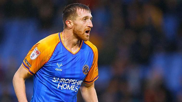 Tom Anderson in action for Shrewsbury Town