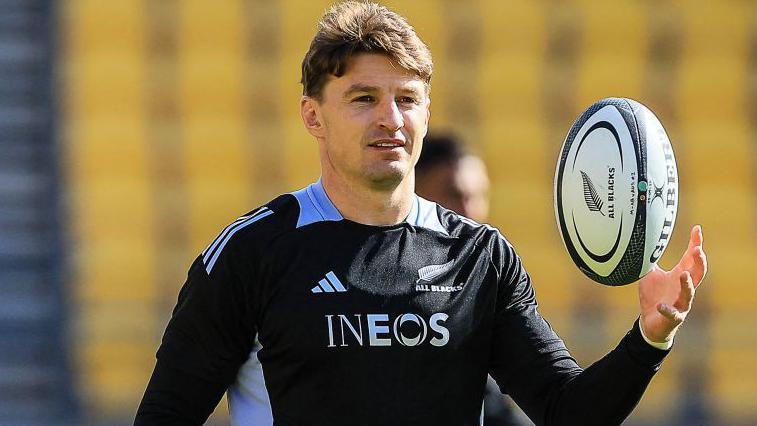 New Zealand's Beauden Barrett wears an Ineos-branded jersey in training