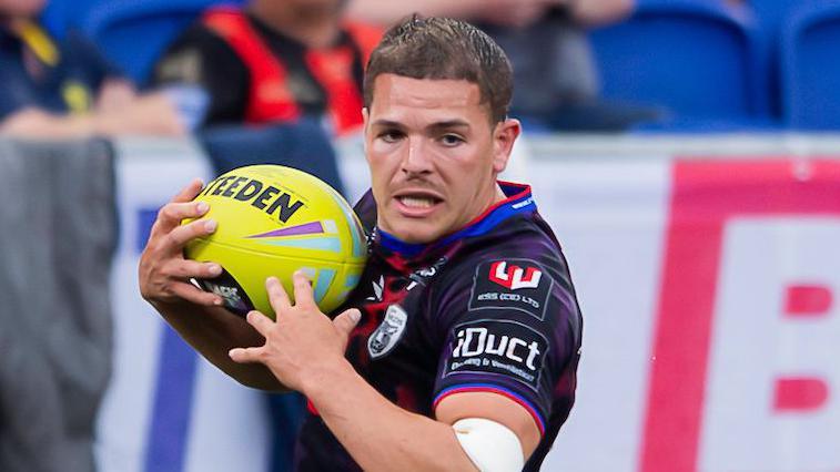 Bailey Hodgson in action for Leigh Leopards against Warrington Wolves earlier this season