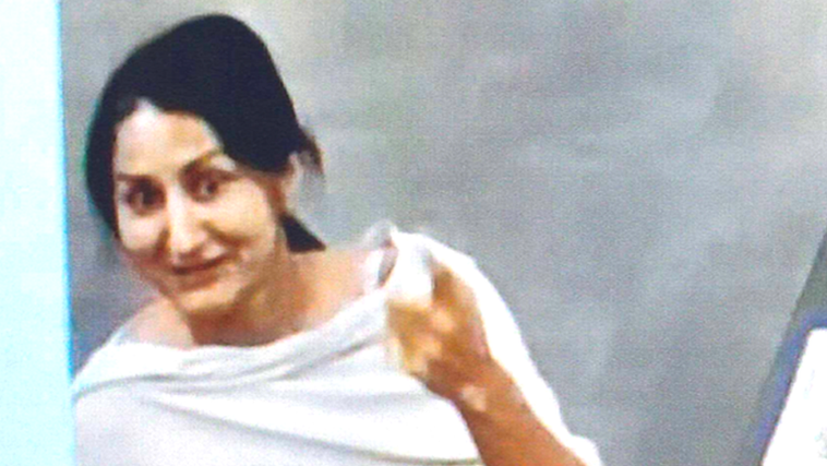 CCTV image of Kaur, wearing a white top