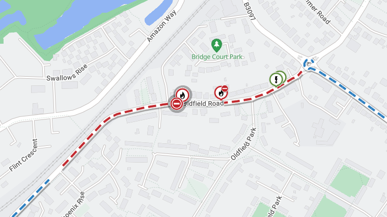 A map with a dotted red line on Oldfield Road. The map is mostly grey with roads marked in white