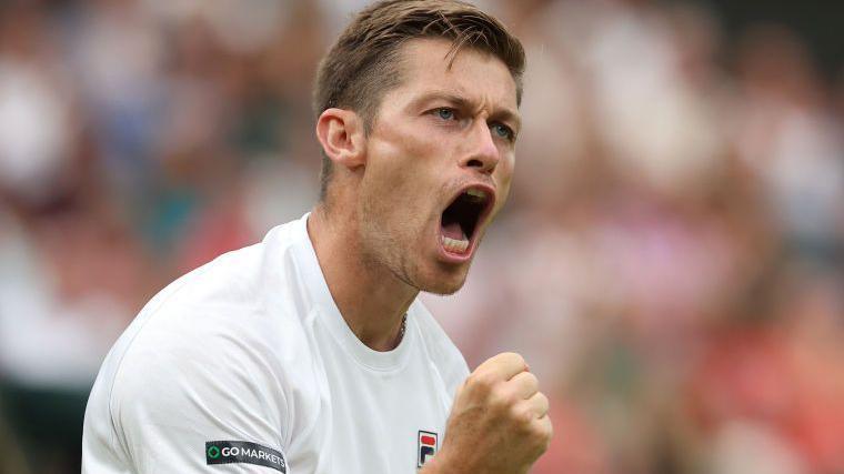 Neal Skupski clenches his fist in celebration