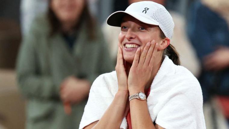 Iga Swiatek celebrates a win at the French Open