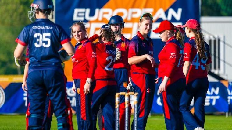 Jersey celebrate taking a wicket