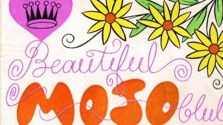 A colourful card that reads "beautiful Mojo Club".