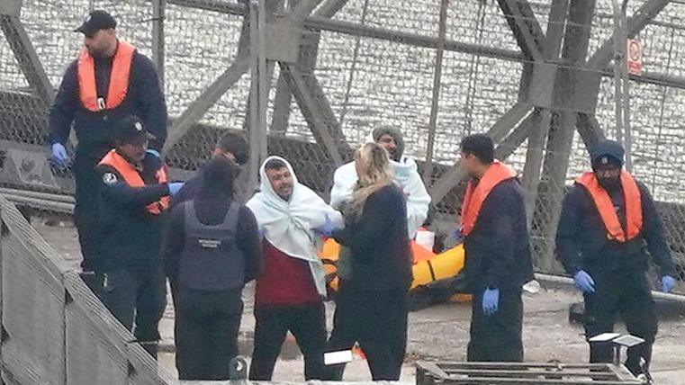 A group of people thought to be migrants are brought in to Dover from a Border Force vessel