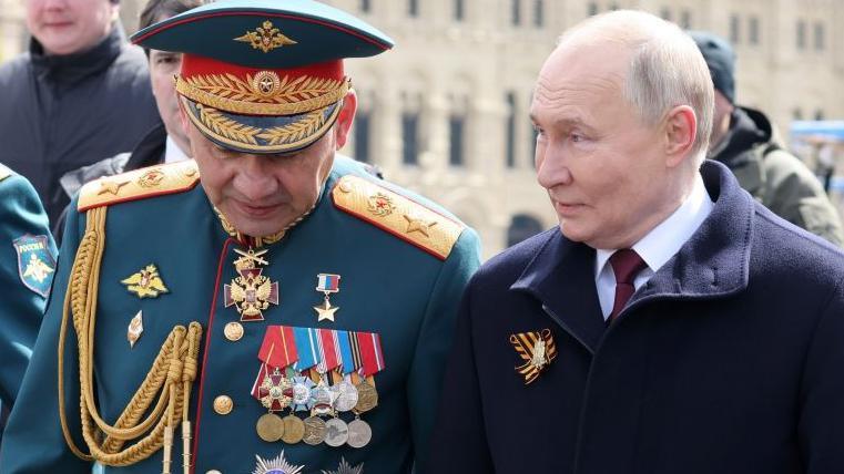 Sergei Shoigu and Vladimir Putin