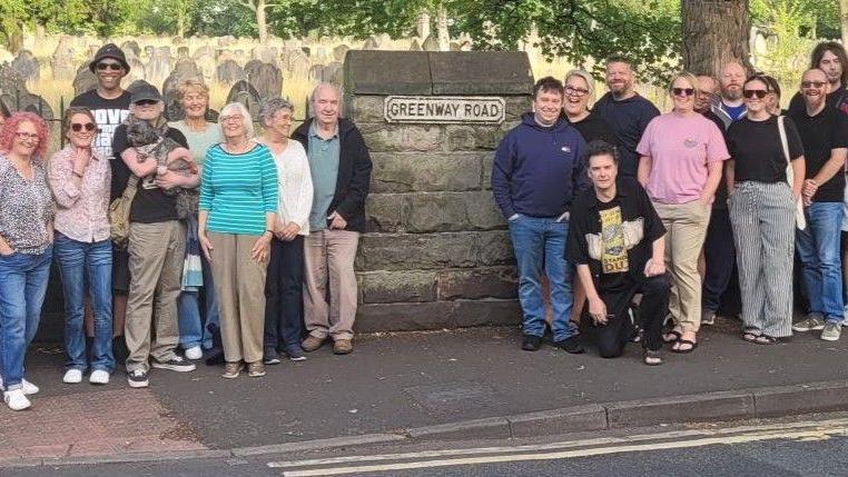 Residents of Greenway Road gather to express their objection to the comments made by MP Sarah Pochin.
