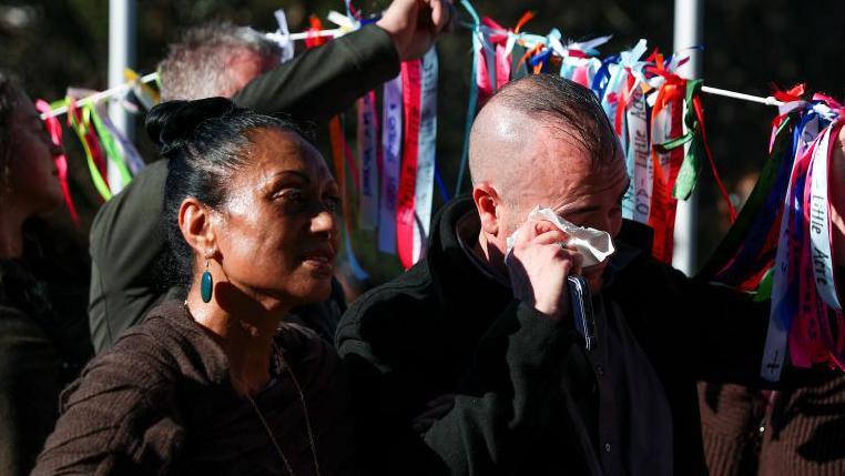 Members of the public arrive as part of a hikoi prior to the release of The Royal Commission of Inquiry into Abuse in Care report at Parliament on July 24, 2024 in Wellington, New Zealand