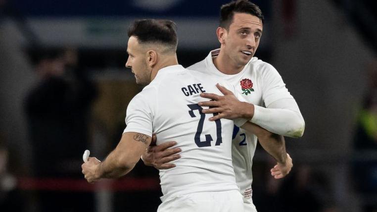 Danny Care [left] embraces Alex Mitchell [right] as he comes on to replace him for England