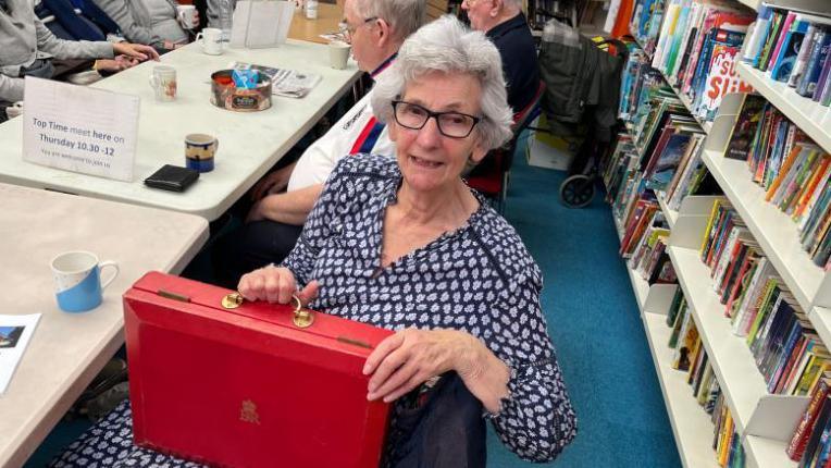 Widow Lorna Punt, 73, from Ipswich, in a library in the town 