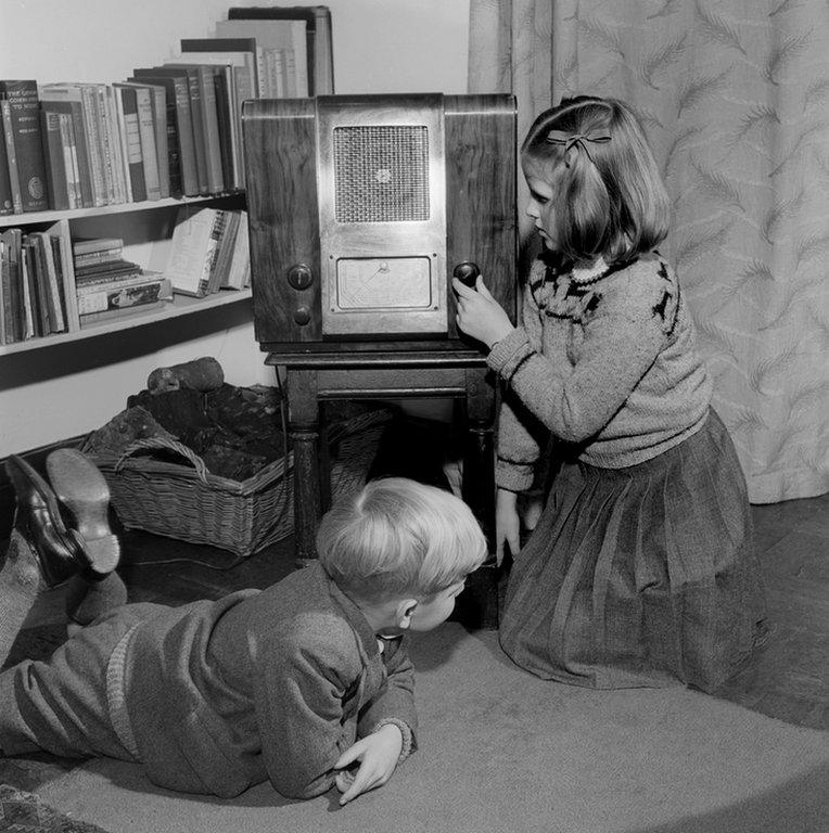 Children listening to the radio