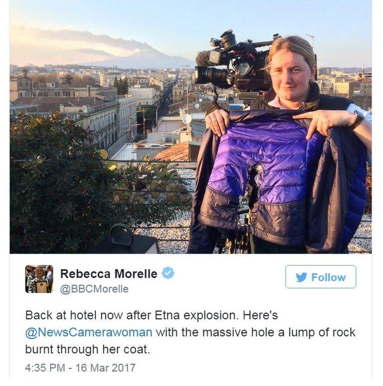 BBC's correspondent Rebecca Morelle tweets a picture of camera woman with hole burnt in jacket from lava