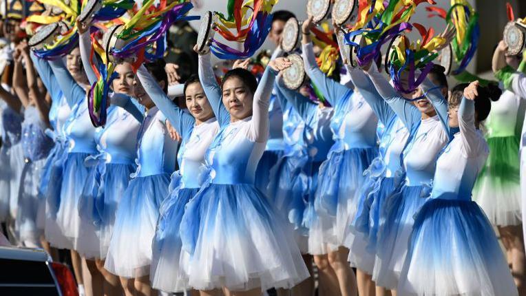 Dancers perform as they welcome Zimbabwean President Emmerson Mnangagwa on 2 September 2024 at Beijing Capital International Airport