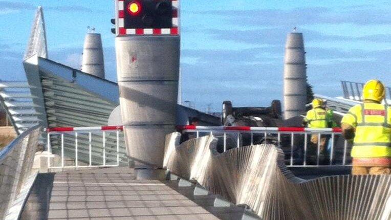 Car overturned on Poole Twin Sails bridge