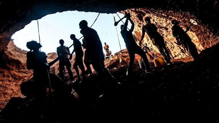 Miners inside tunnel