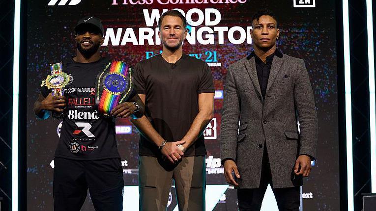 Ishmael Davis, promoter Eddie Hearn and Bilal Fawaz pose for the cameras at a news conference