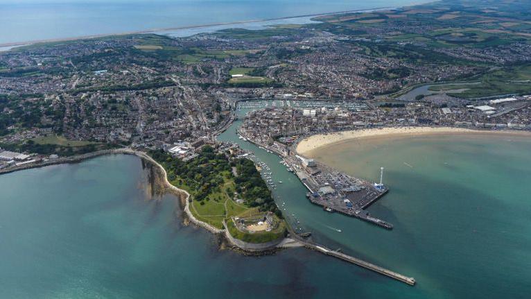 An aerial view of Weymouth with the sea in the foreground 