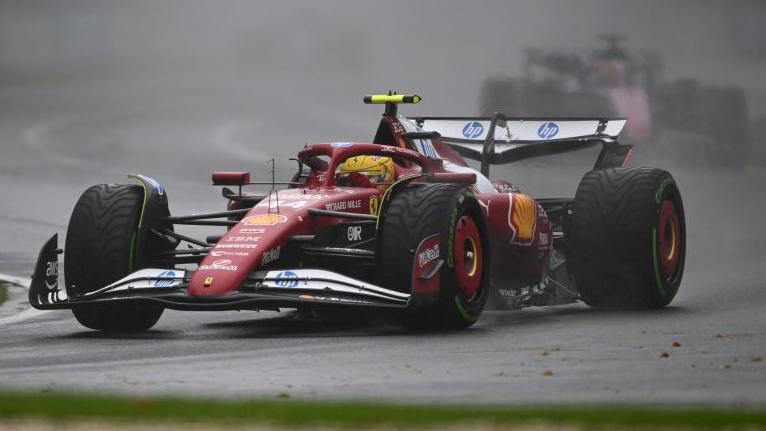 Lewis Hamilton driving his Ferrari in the wet at the Australian Grand Prix