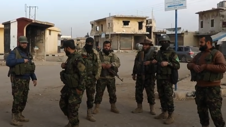 Footage showing opposition faction fighters taking control of a town of Aleppo