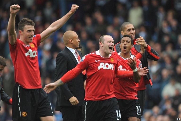 Manchester United celebrate winning the title